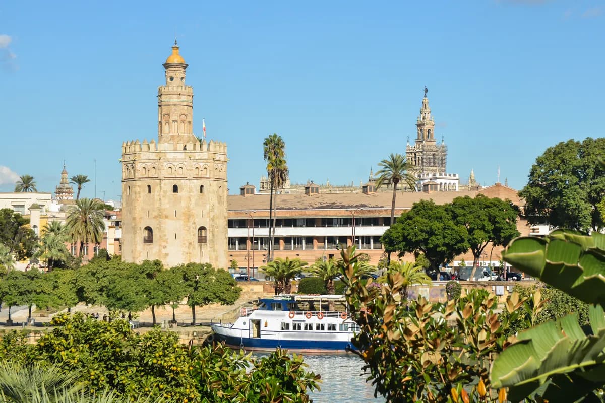 Torre del Oro and Seville Cathedral near the Guadalquivir River